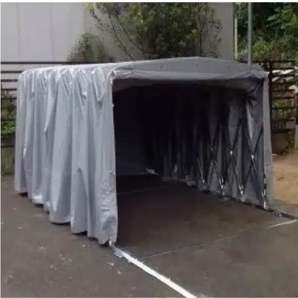 Dükkan önü vitrin üzerinde akordiyon tente, güneş kırıcı raylı katlanır tente sistemi